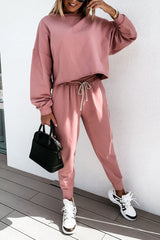 Rosa, einfarbiges Sport-Outfit mit kastigem Pullover und Hose