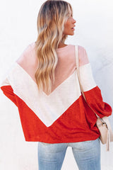 Orangefarbenes Oversize-Stricktop mit Chevron-Muster