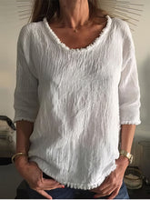 Lässiges T-Shirt mit Rundhalsausschnitt und langen Ärmeln und Quaste