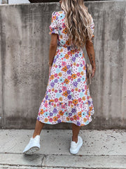 Langes Kleid mit V-Ausschnitt und Schlitz