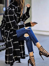 Karierter Wollmantel mit Reverstasche und Gürtel