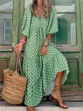 Bedrucktes, langärmliges, lockeres Bohemian-Kleid