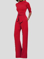 Einfarbiger Jumpsuit mit weitem Bein und fünfeckigen Ärmeln und Gürtel
