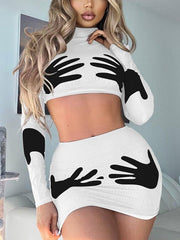 Zweiteiliges Set mit schmalem, bedrucktem Crop-Top und Minirock