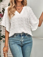 Einfarbiges T-Shirt aus Wolle mit V-Ausschnitt