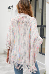 Poncho estampado con detalle de flecos