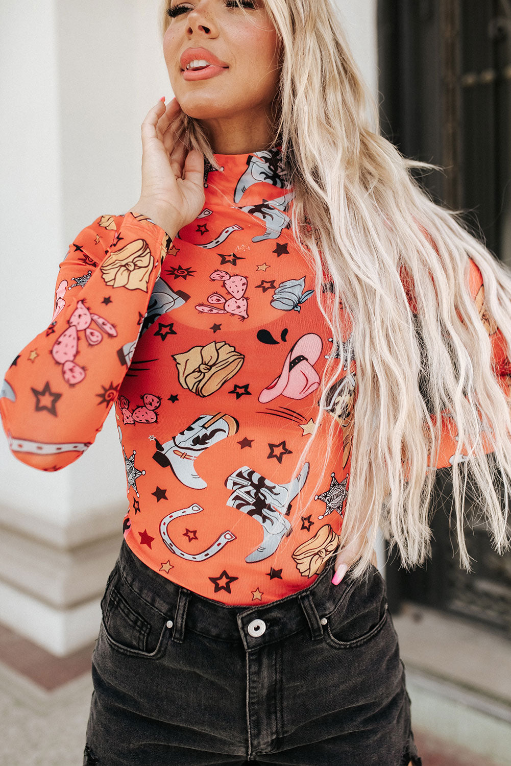 Orange Rodeo Bound Printed Long Sleeve Bodysuit