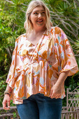 Orange Plus Size Floral Print V Neck Peplum Blouse