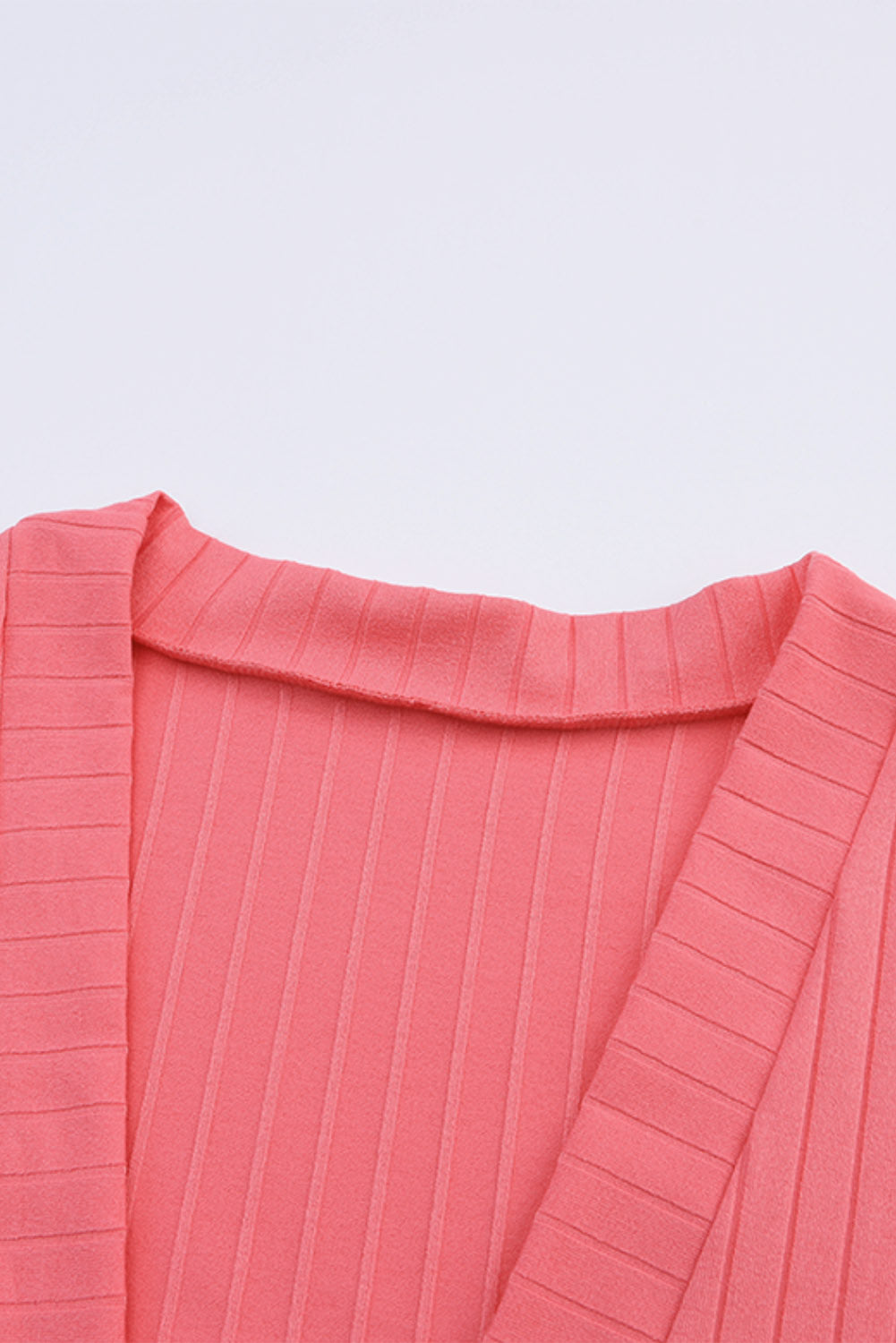 Rosa Strickjacke mit offener Vorderseite und Taschen